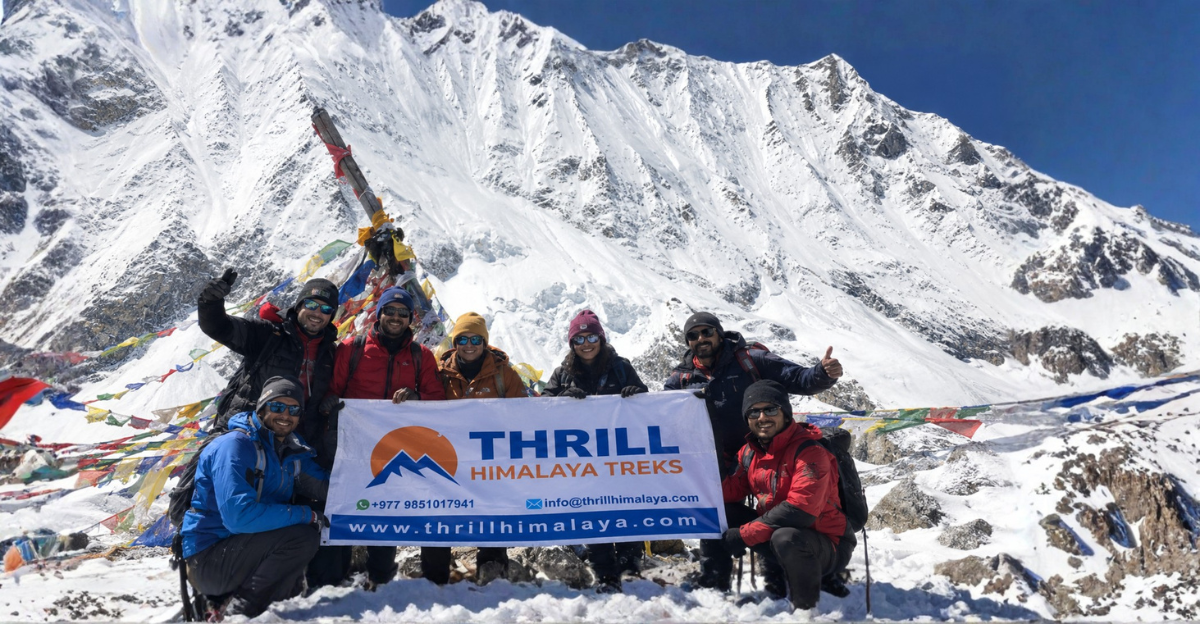 Trekkers walking along a mountain trail during the Manaslu Circuit trek