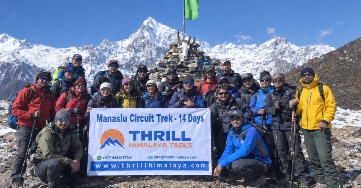 Group of happy trekkers on the Manaslu Circuit trail with Thrill Himalaya Treks